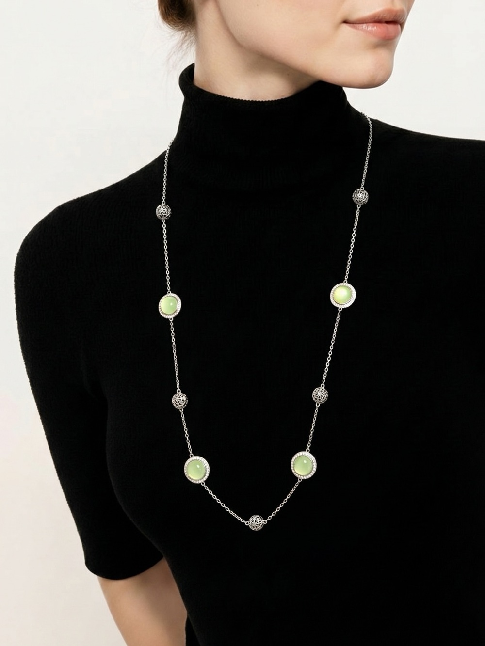 Silver necklace with green beads